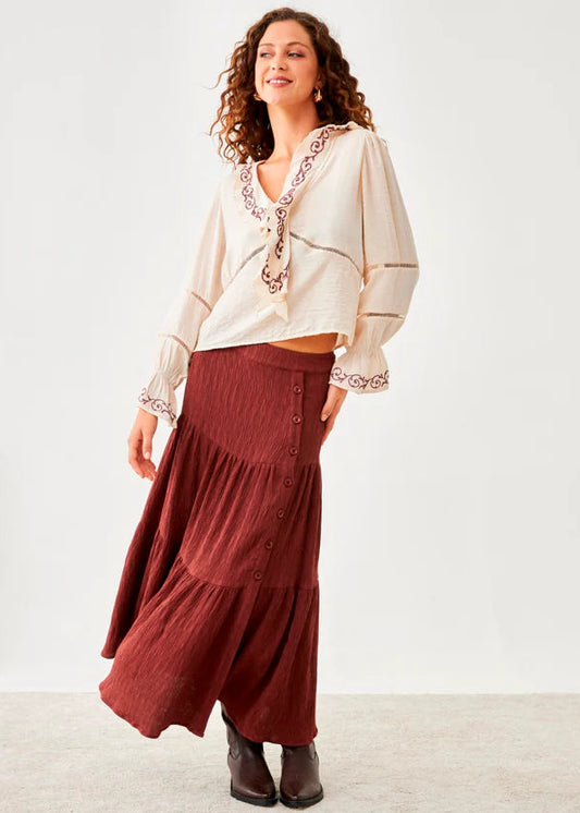 Falda volantes y botones