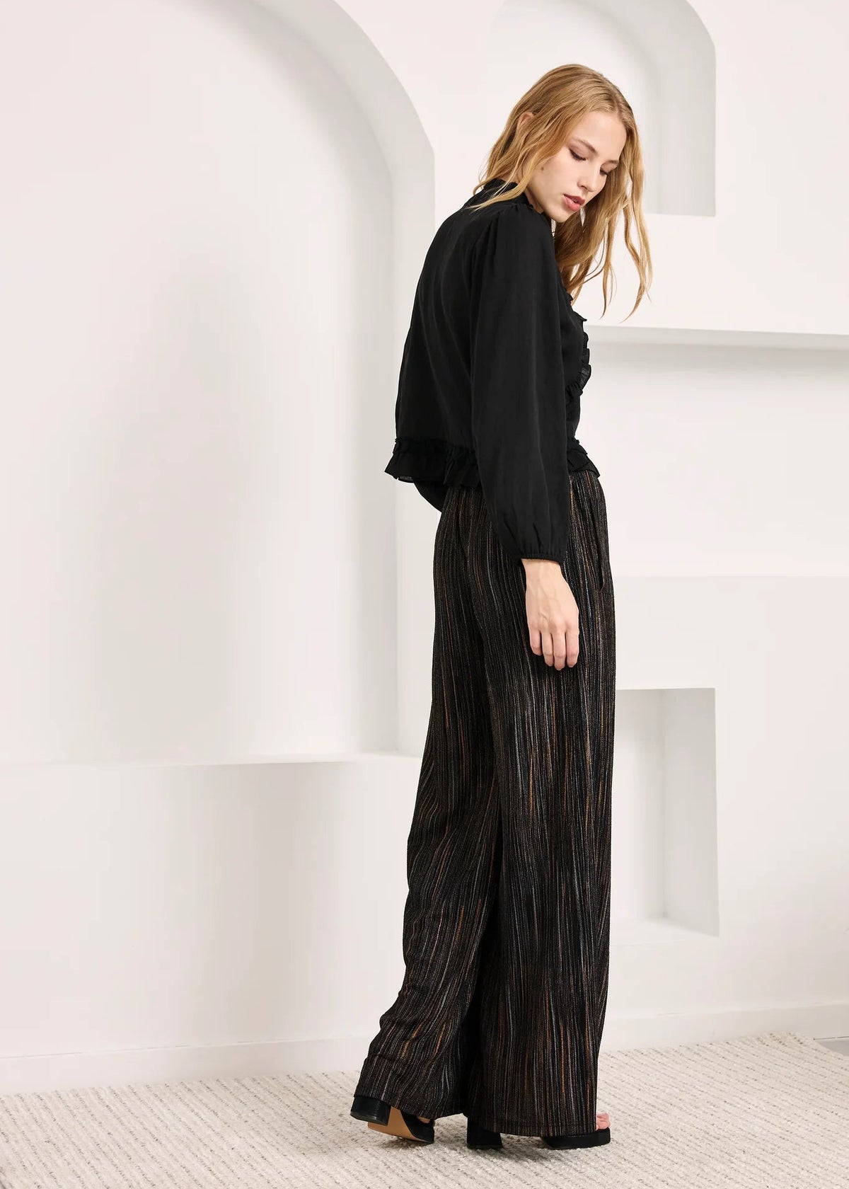 Blusa volantes negra