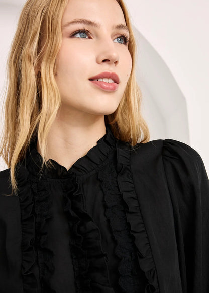 Blusa volantes negra