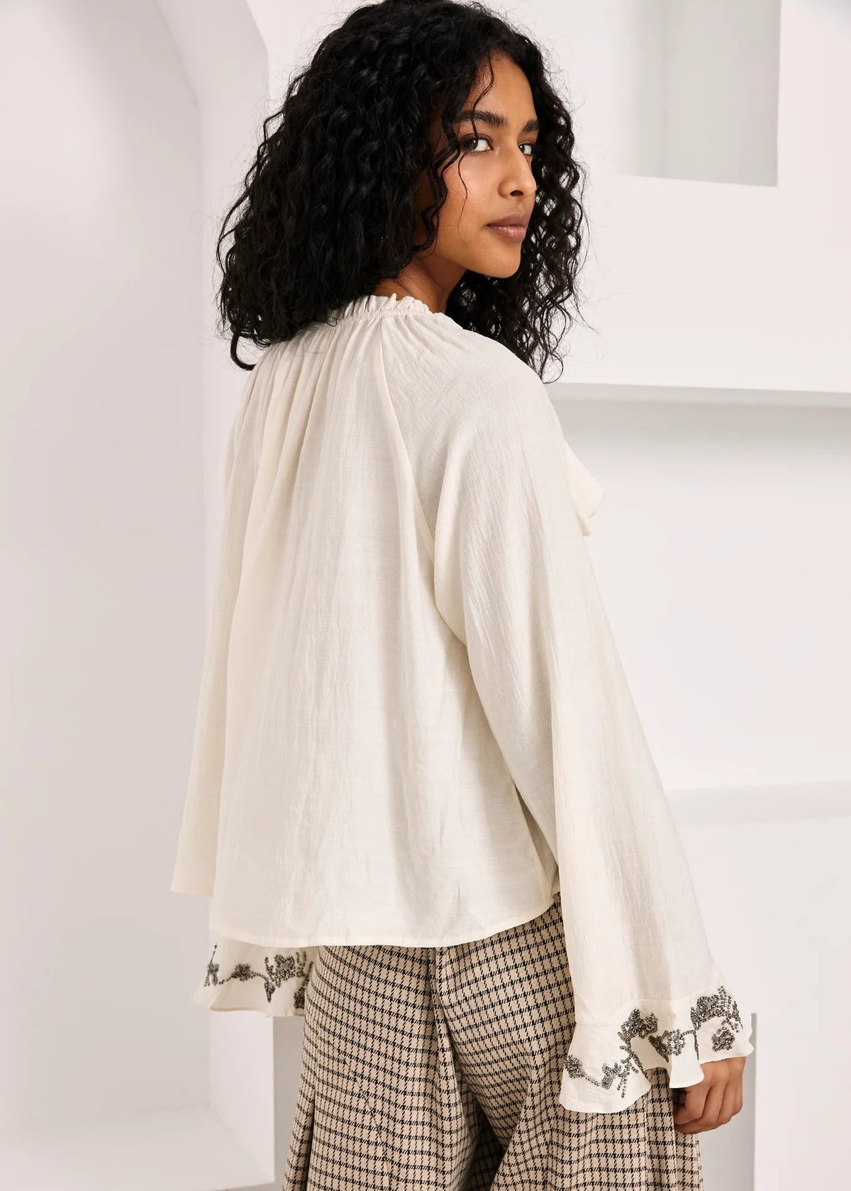 Blusa volantes puño