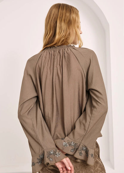 Blusa volantes puño