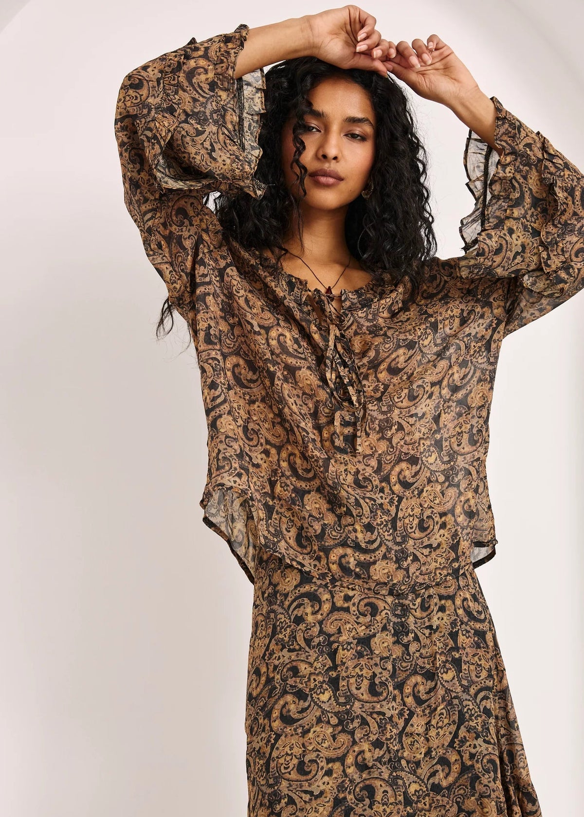 Blusa fluida volantes