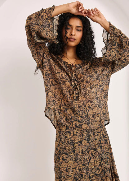 Blusa fluida volantes