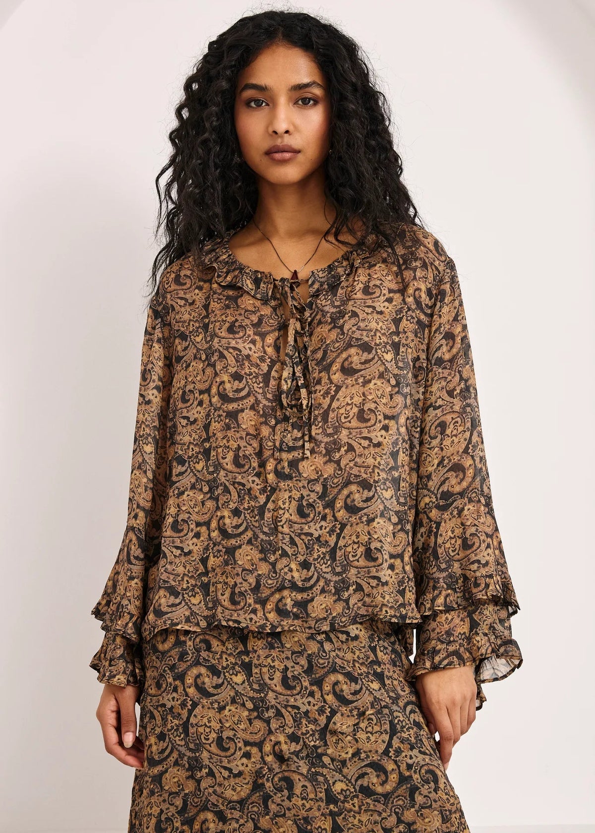 Blusa fluida volantes