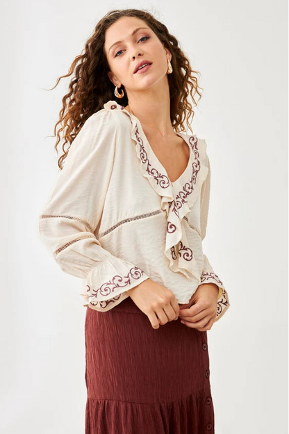 Blusa con volantes bordada