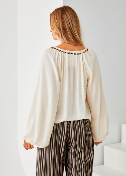 Blusa bordada pompones